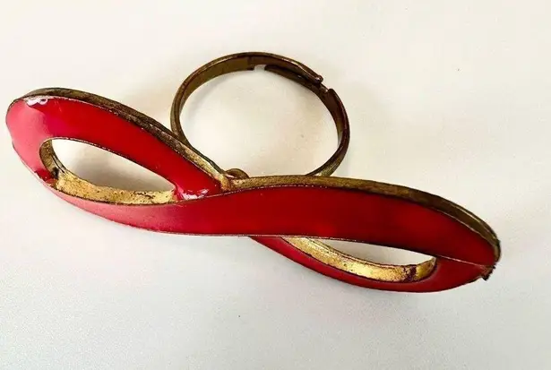 Pink and gold tone infinity ring