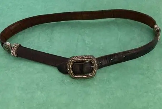 Ladies leather reversible belt black and brown with embellishments. Size med/30.