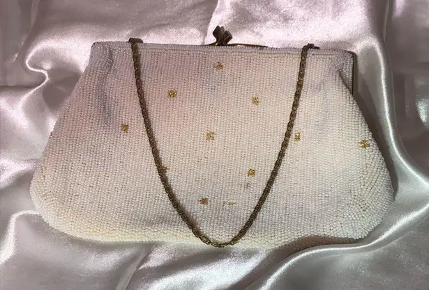 Vintage white beaded purse with gold chain wrist chain.