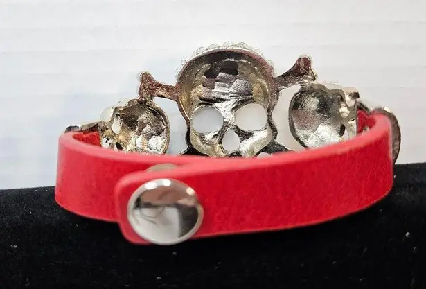 Triple rhinestone skulls with adjustable genuine leather snap bracelet