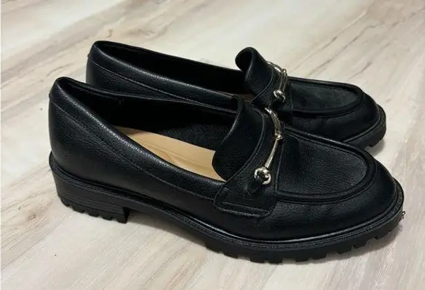 Kelly & Katie Black Leather Flats with Sleek Design