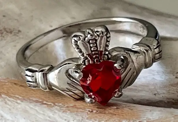 Sterling Silver Claddagh Ring with Garnet Heart Stone