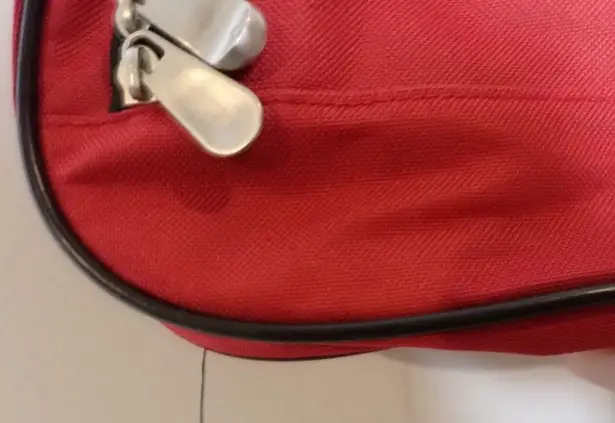 Saddlebred Brand New Red Small Soft Luggage with Trolley a Passthrough Carry On