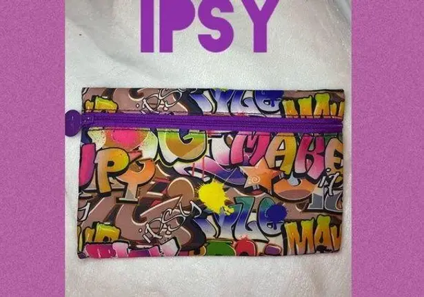 Ipsy  zip up Graffiti cosmetics bag multi colored (purple,yellow,pink,green)