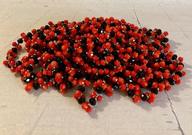 Source Unknown Pile of Red & Black Plastic Stretch Bracelets Louisville/Cal State/Grinnell