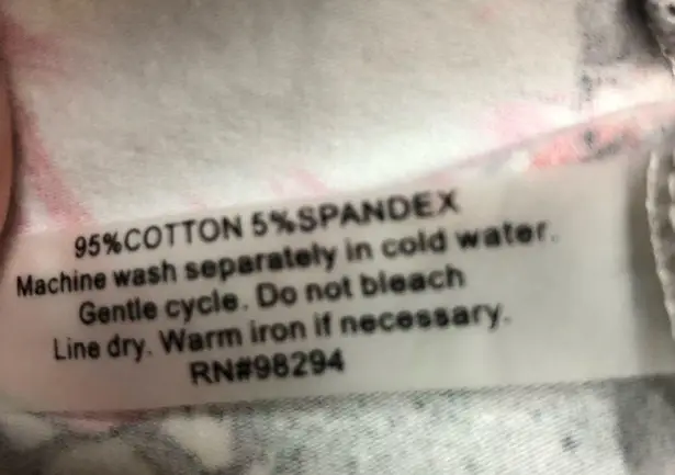 TIO Thomas and Olivia sweater 95 cotton, five spandex three