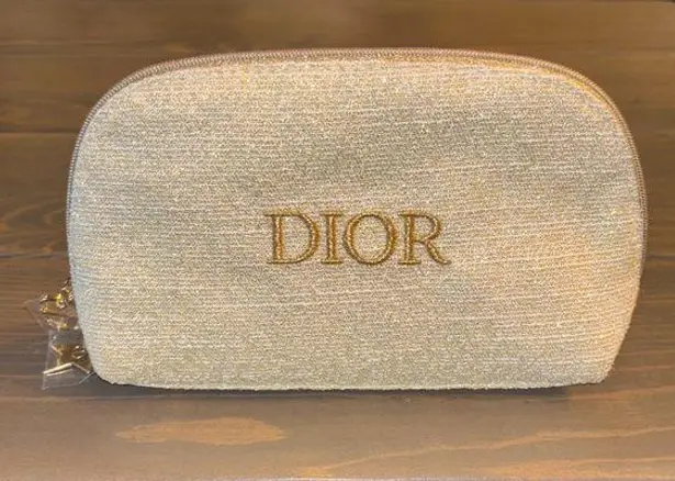 Dior Holiday 2024 limited-edition gold novelty cosmetic bag
