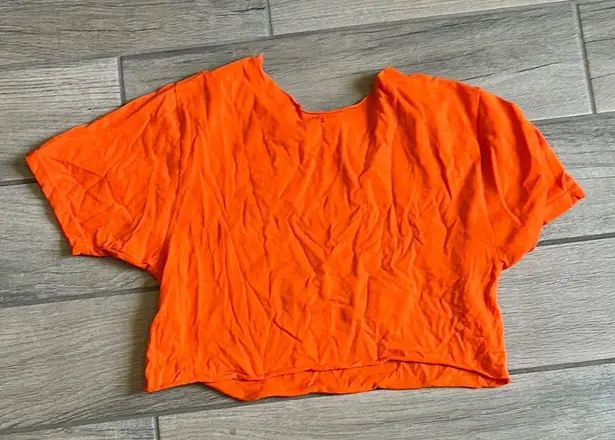 Vibrant Orange Halloween Crop Top with Jack