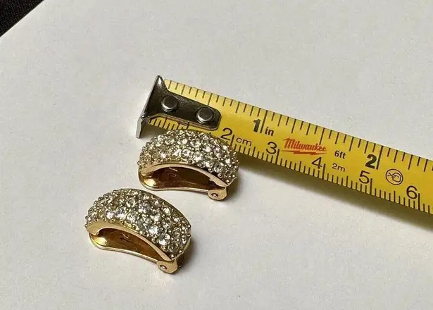 Roman Signed Rhinestone Gold Tone Clip On Earrings