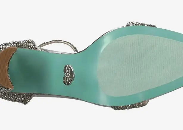 Betsey Johnson heels /women silver in color size 7.5 gorgeous elegant.