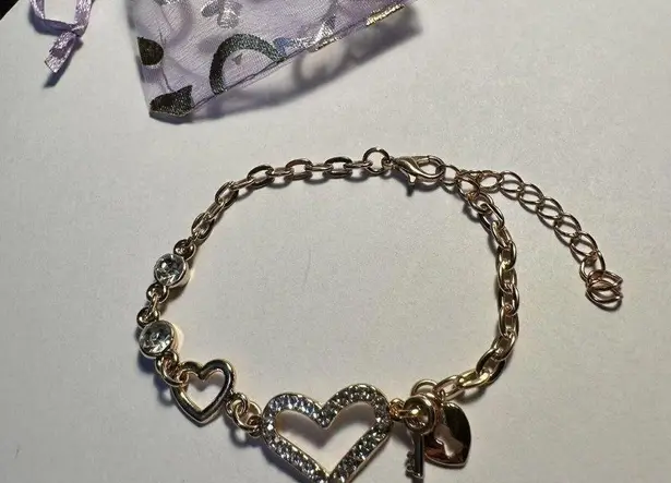 NWOT Gold Tone Clear Rhinestone Heart Tennis Bracelet Adjustable 6 3/4