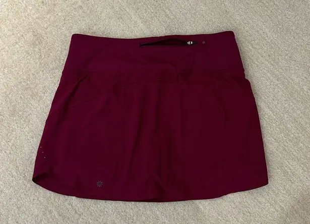 Athleta running skort cranberry color size medium