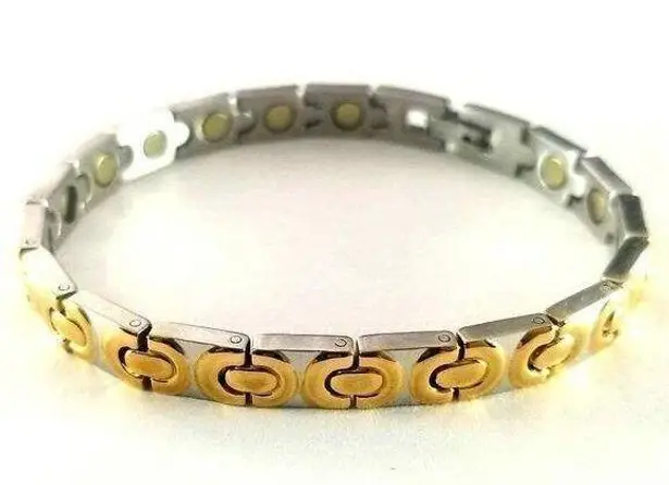 New/never worn stainless steel magnetic bracelet. 7.5 inches Gold