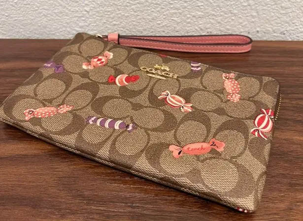 coach Large Corner Zip Wristlet In Signature Canvas With