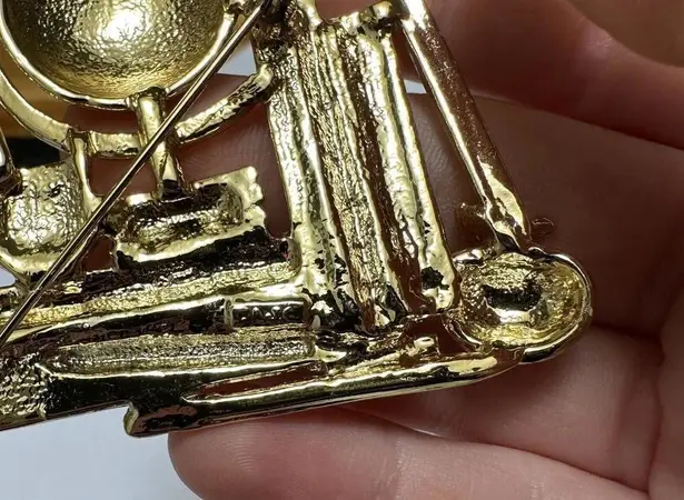 Signed AJC Gold Tone Earth Glove On A Stack Of Books Brooch Pin