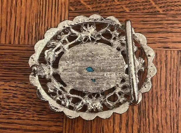 Metal belt buckle with a man