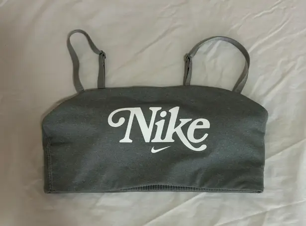 Nike Sportwear's Women's Logo Dri-Fit Femme Bandeau Sports Bra in Gray