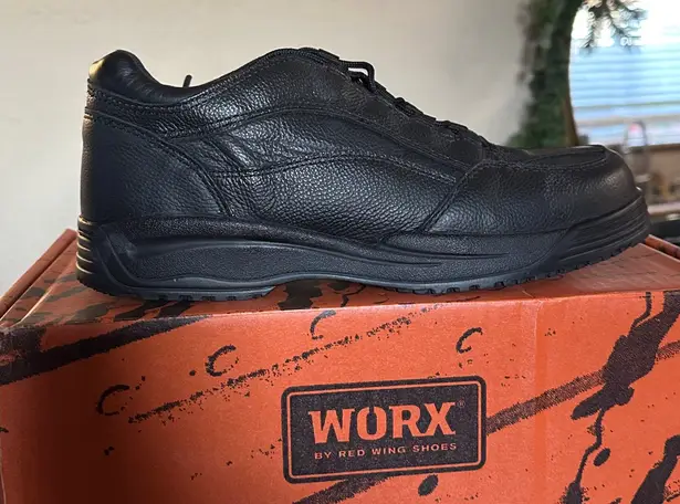 Works by Red wing black leather Worx by Red Wing safety toe athletic shoes. Size 9