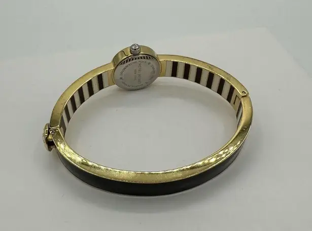 Henri Bendel Miss Bendel Black Gold Enamel Stripe Watch Bangle Quiet Luxury