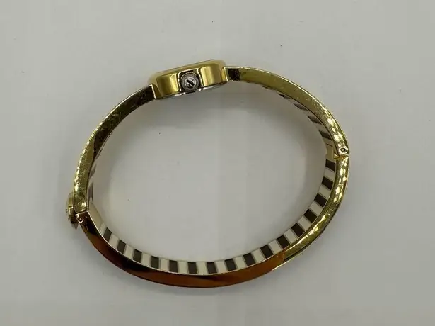 Henri Bendel Miss Bendel Black Gold Enamel Stripe Watch Bangle Quiet Luxury