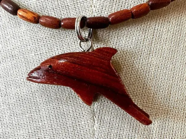 Wood beaded dolphin pendant necklace Brown