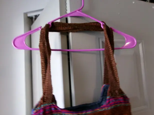 Medium size canvas bag hand bag shoulder back in multi-colors size one size.