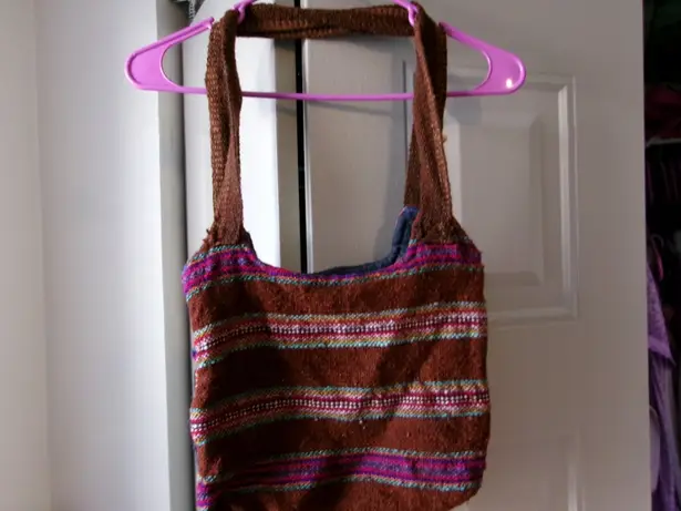 Medium size canvas bag hand bag shoulder back in multi-colors size one size.