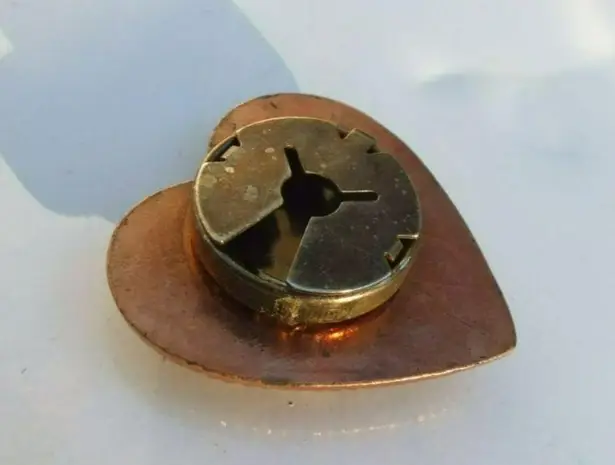 Older Style Copper Heart Brooch With Unique Patterns Orange