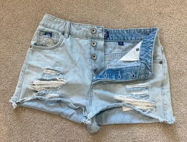 Superdry Vintage  light wash distressed high rise jean shorts in size 29