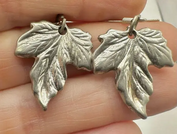 Silver tone maple leaf earrings