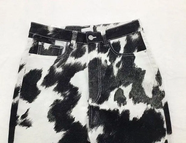 We Wore What  Cow Print Black and White Stiletto Slit Jeans SIZE 28 X 33 NWOT