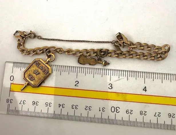 Monet Vintage  gold tone violin class of '67 charm bracelet