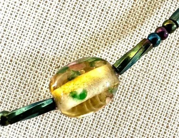 Green open circle beaded pendant necklace