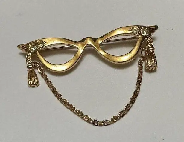 Signed Avon Gold Tone Metal Cat Eye Glasses Tassel Chain Rhinestone Brooch Pin