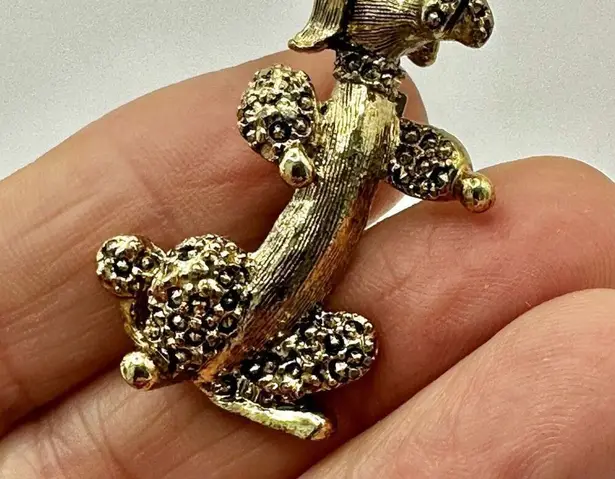 Gerry’s gold tone poodle brooch
