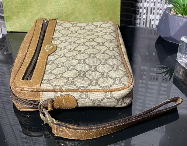 Gucci Authentic  GG Plus Clutch Bag