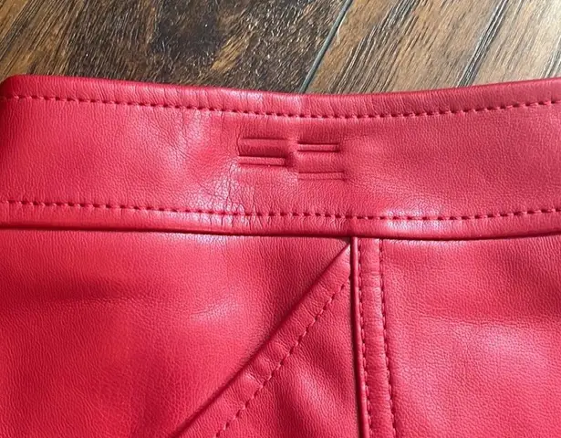 EXPRESS Red leather skirt. Size 14. NWT. Clip marks from hanger. Should relax some.