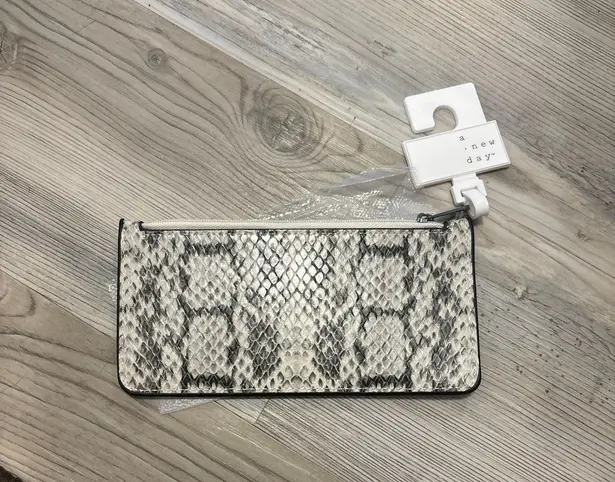 A New Day Faux Leather Zip Around Wallet, zip closure, side slots for credit cards, side pocket, length is 7, width is 3.5 - Image 7