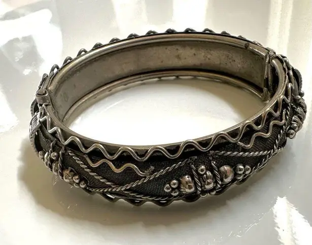 Silver tone ornate hinged bangle bracelet