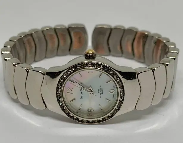 Jaclyn Smith women’s Quartz analog watch 22mm pearl dial cuff bracelet 7” runs