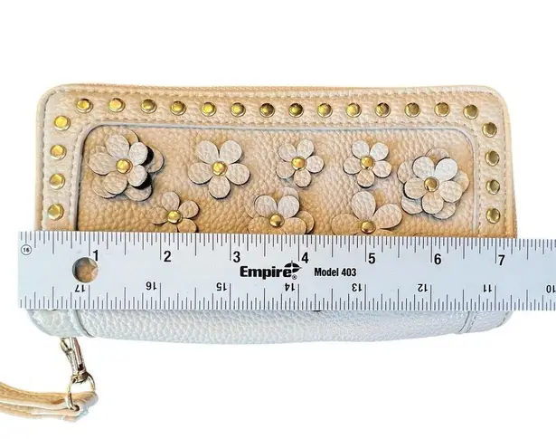 Under One Sky Wristlet Ivory with leather flower cut outs