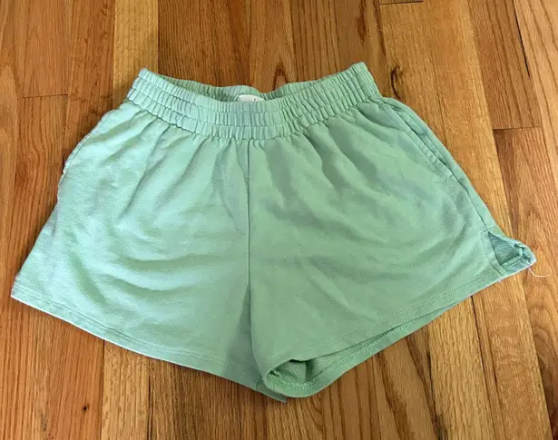 green sweat shorts