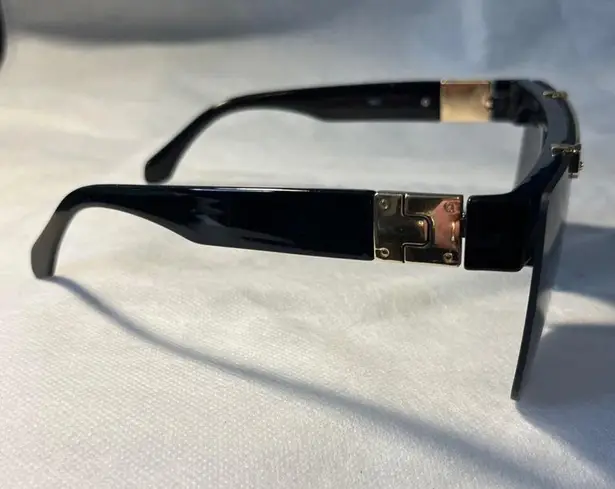 Zero UV Black Flip sunglasses with gold accents