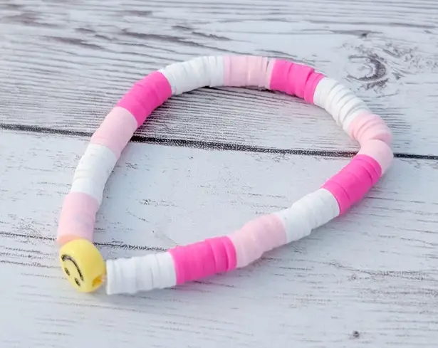 Pink & White Stretch Bracelet with a Smiley Face