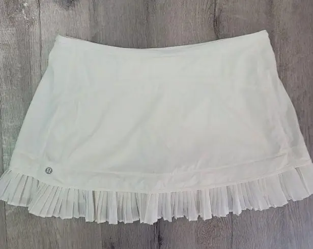 Lululemon  City Sky Run By Skirt White size 10 pockets ruffle tennis skirt