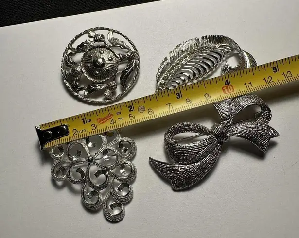 Lot Of 4 Silver Tone Brooch Pins Feather With Rhinestones, Bow, Swirls, Round