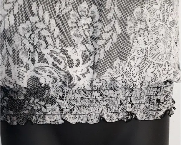 B. Wear black and white lace halter tank