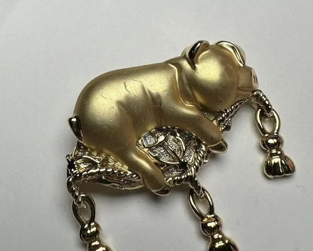 Signed AJC Gold Tone Pig On Tasseled Pillow Brooch Pin