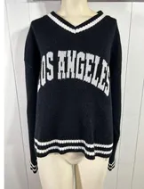 Sweaters & Knits image