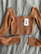 Sweaters & Knits image